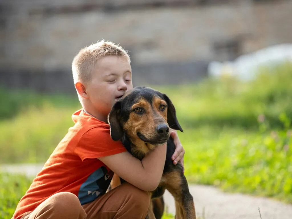 A child with a dog