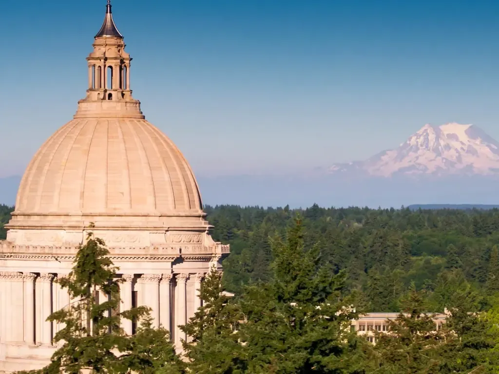Washington State Capitol with Mount Rainier in the distance, representing public-records requests to government agencies.